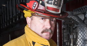 Firefighter wearing his helmet